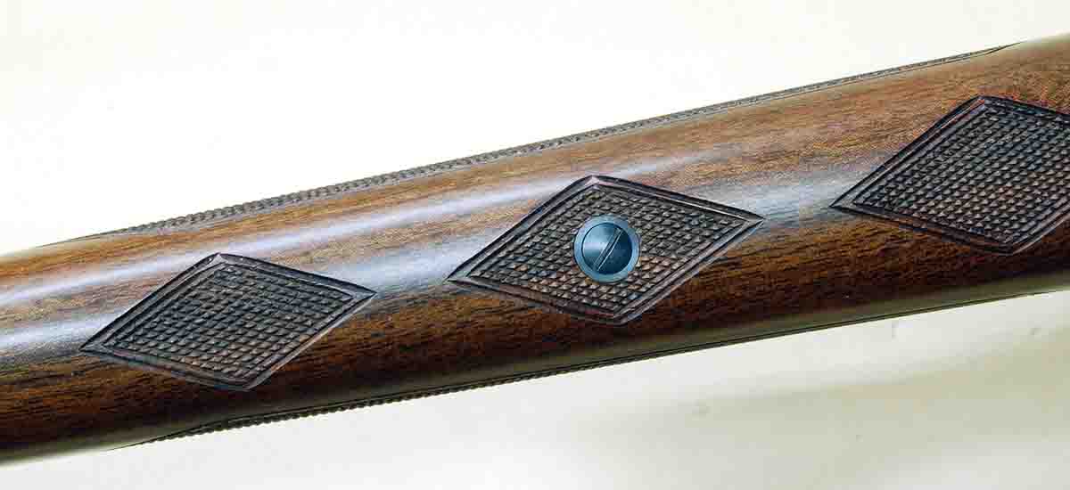 Reproduction sporters even include the forend bedding screw of original guns. Its usefulness is questionable.
